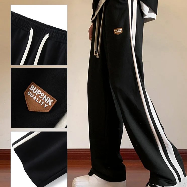 男性レジャー運動とベルベットの厚いコーデュロイ長ズボンのストレートゆるい長ズボン