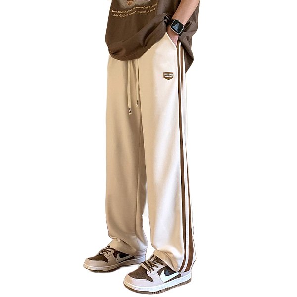 男性レジャー運動とベルベットの厚いコーデュロイ長ズボンのストレートゆるい長ズボン